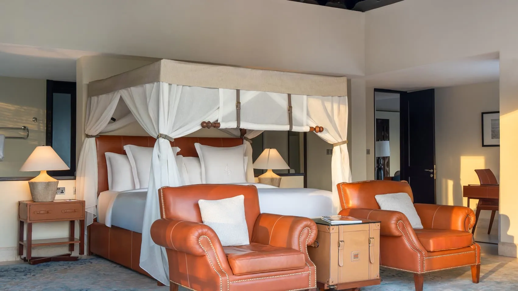 Four-poster bedroom at Four Seasons Safari Lodge Serengeti