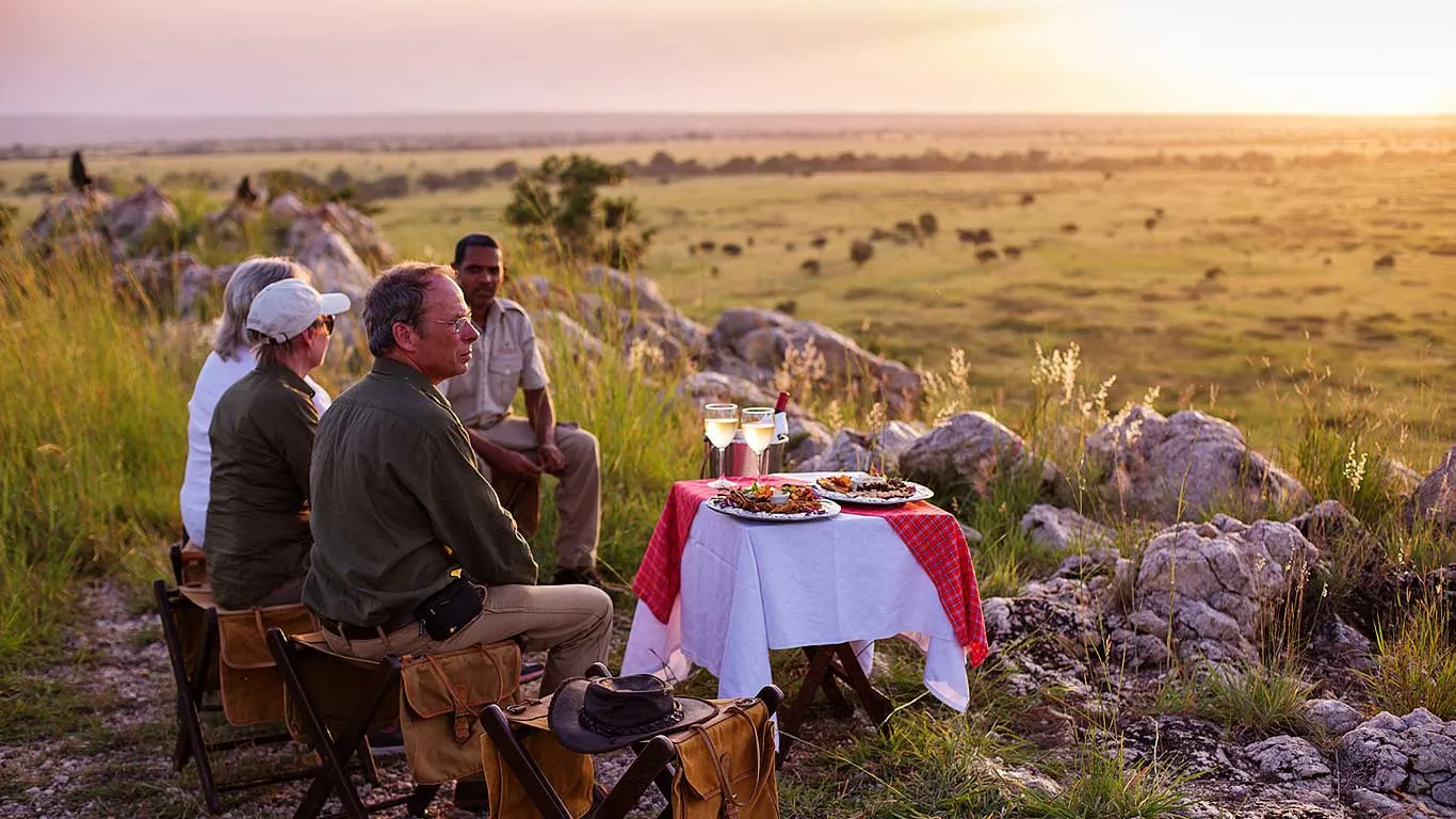 Dinner in the bush at sunset near Tarangire Treetops