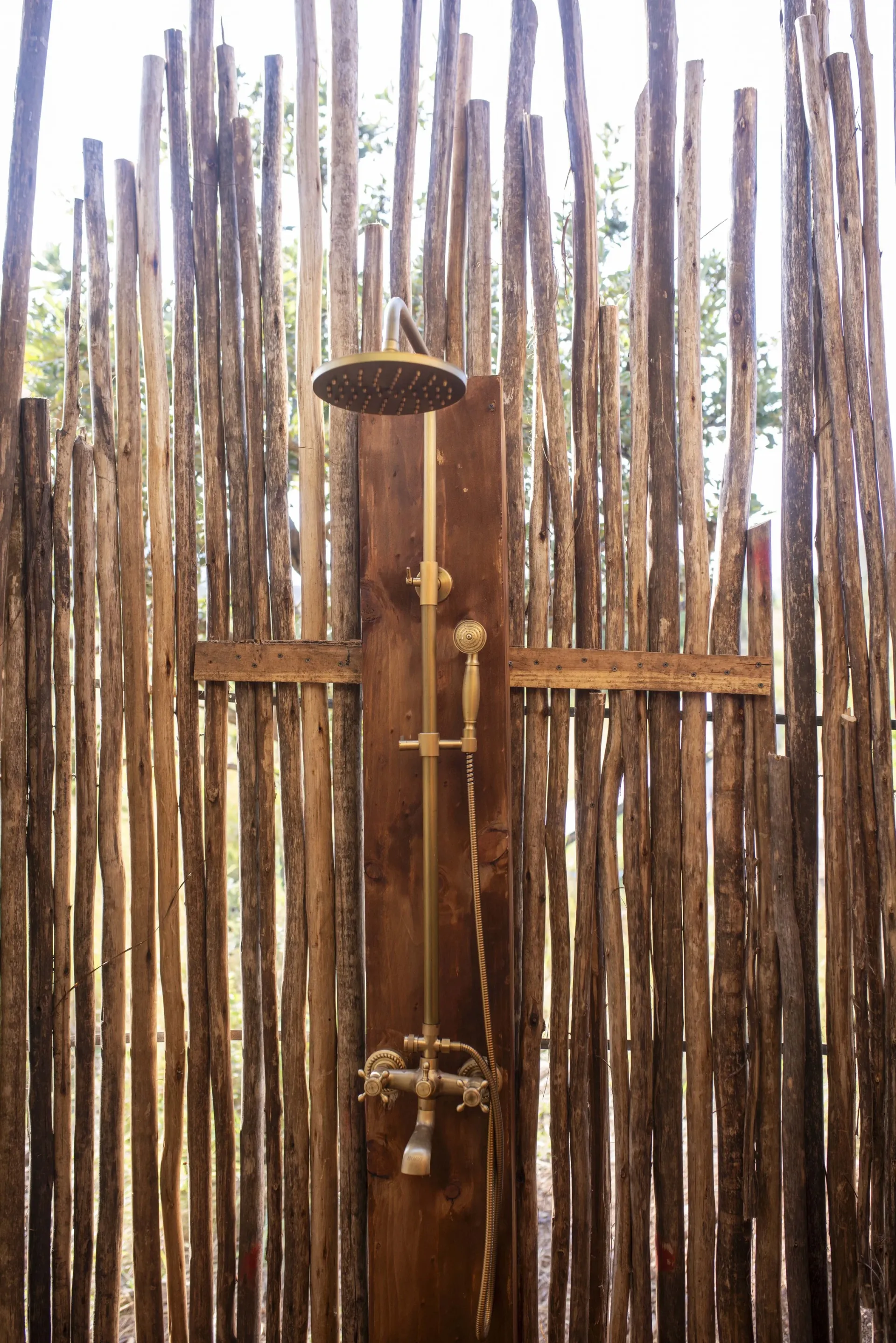 Outdoor shower at a Zuri Camp tent