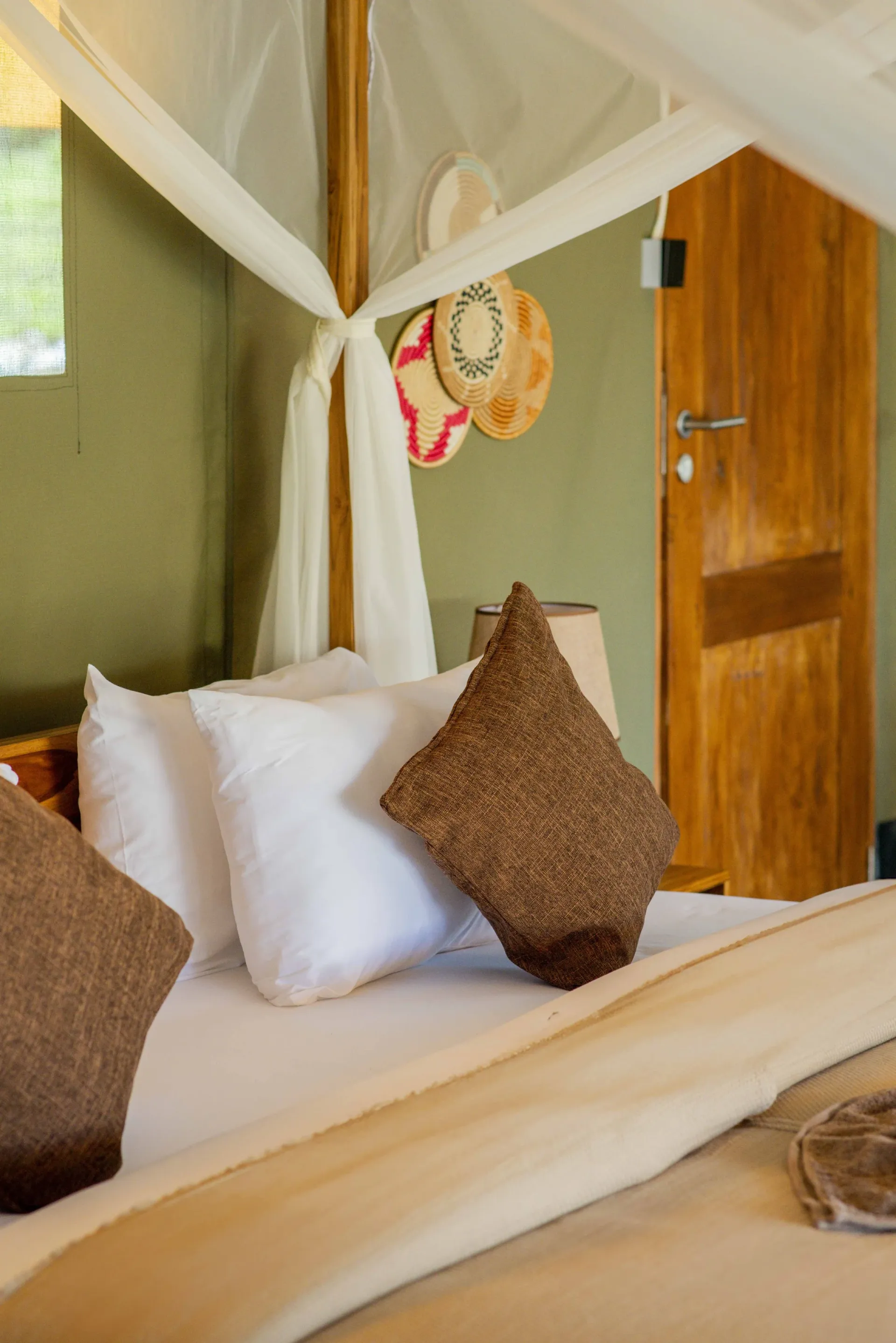 Tent bedroom with super king bed at Zuri Camp Serengeti